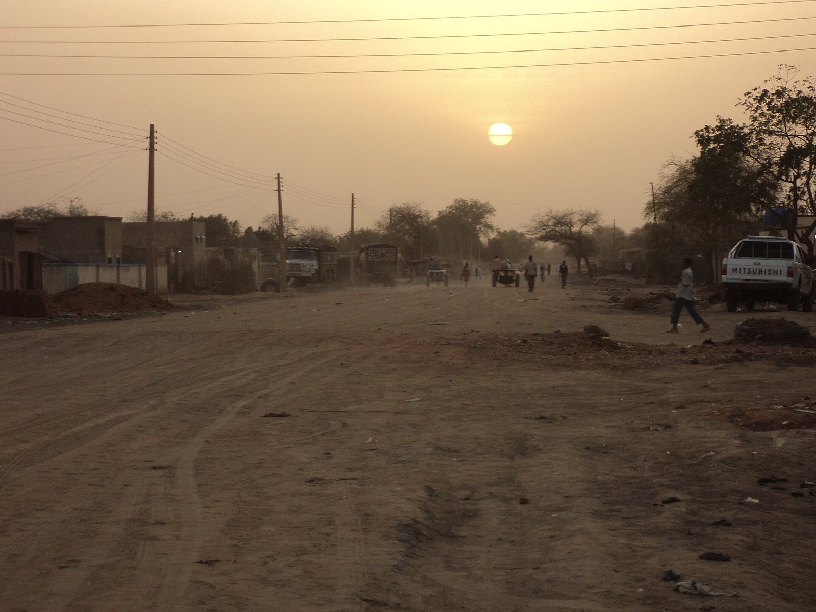 Drone strike on Sudan market transport hub kills 80 as wave of attacks leaves over 160 dead
